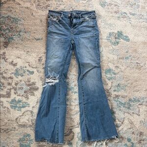 American Eagle Outfitters medium blue distressed flare jeans